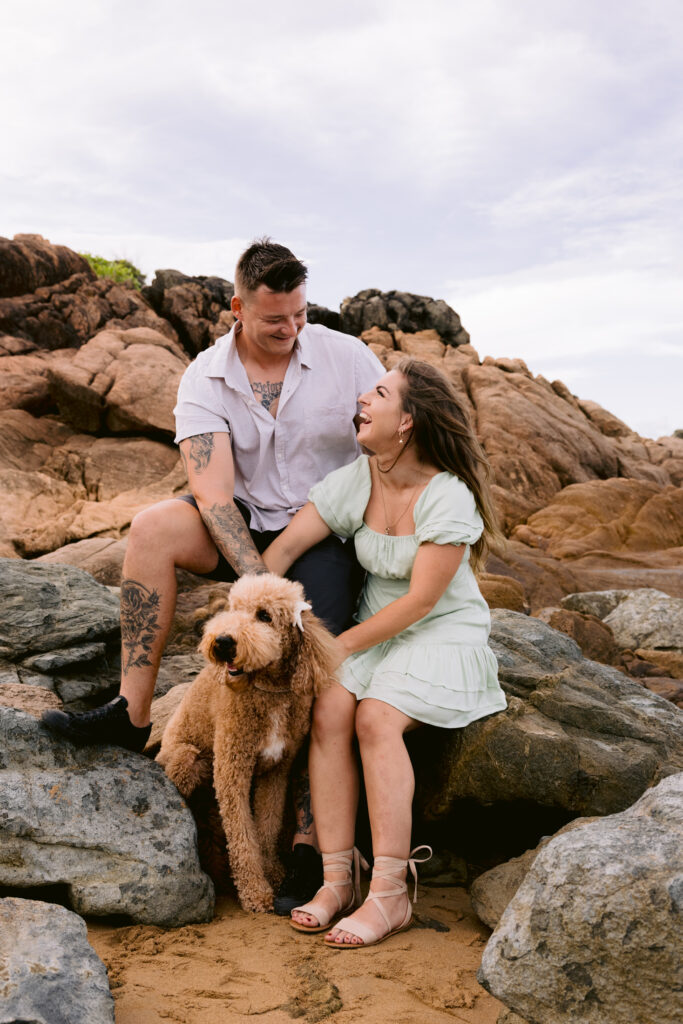 Engagement photo of Trudy, Beau and Mopsy at Palleranda on the beach in Townsville.
