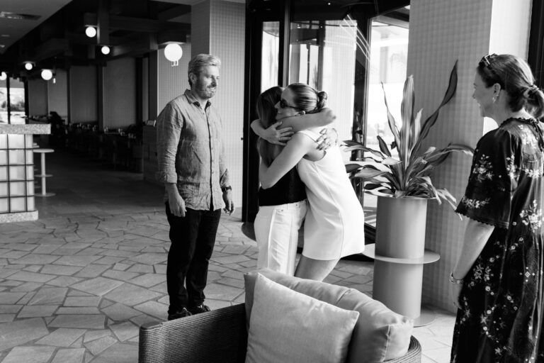 Sister in laws hug as they see each other after a long time