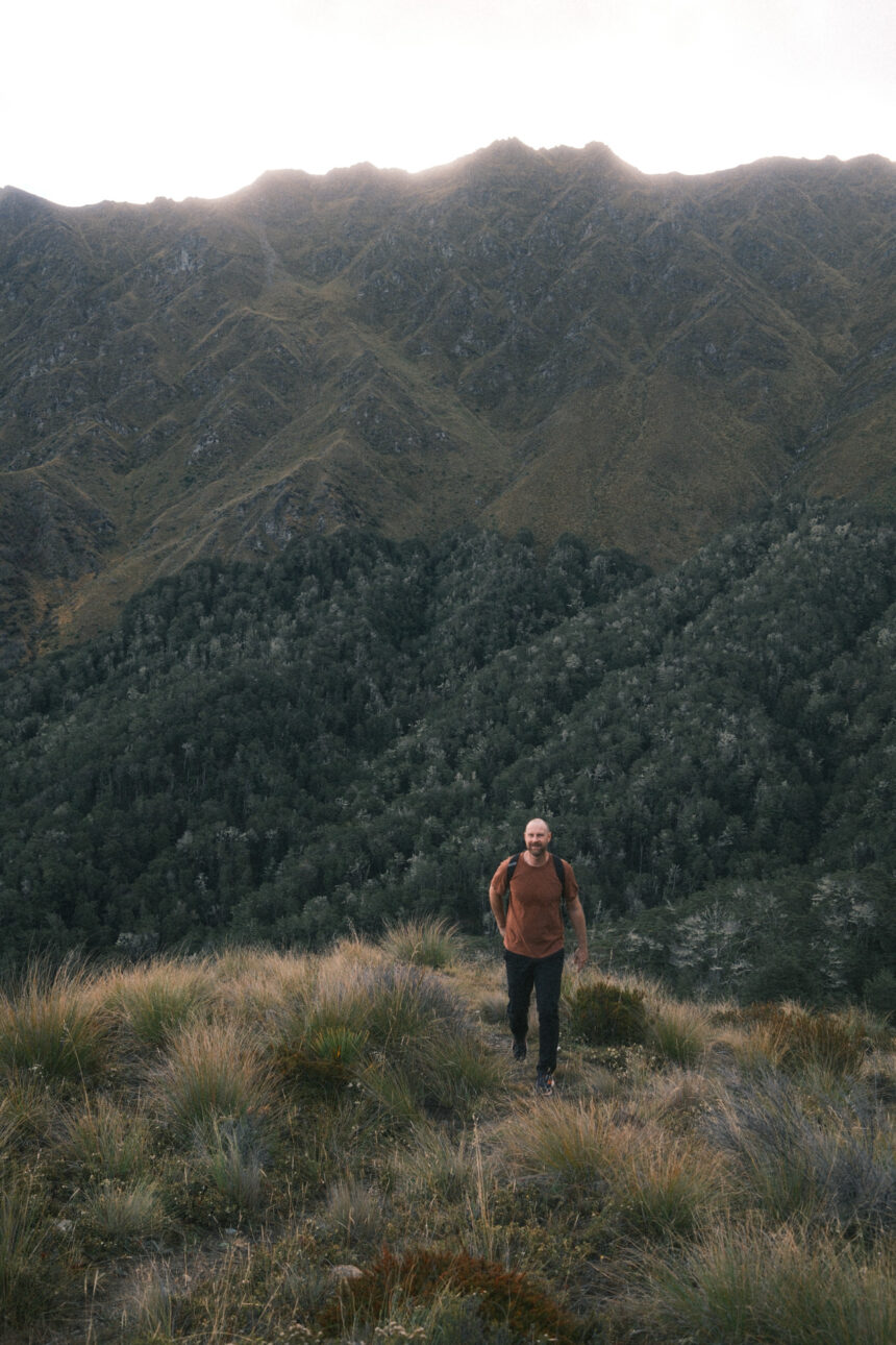 A man is on the path to hiking Ben Lomond