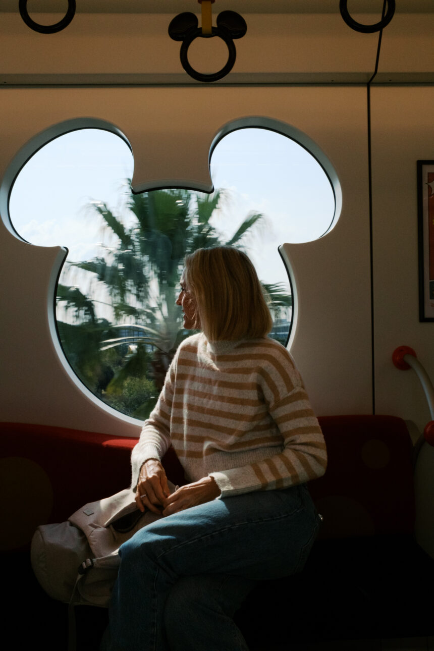 Katie is riding the Disney train to get to Tokyo Disney