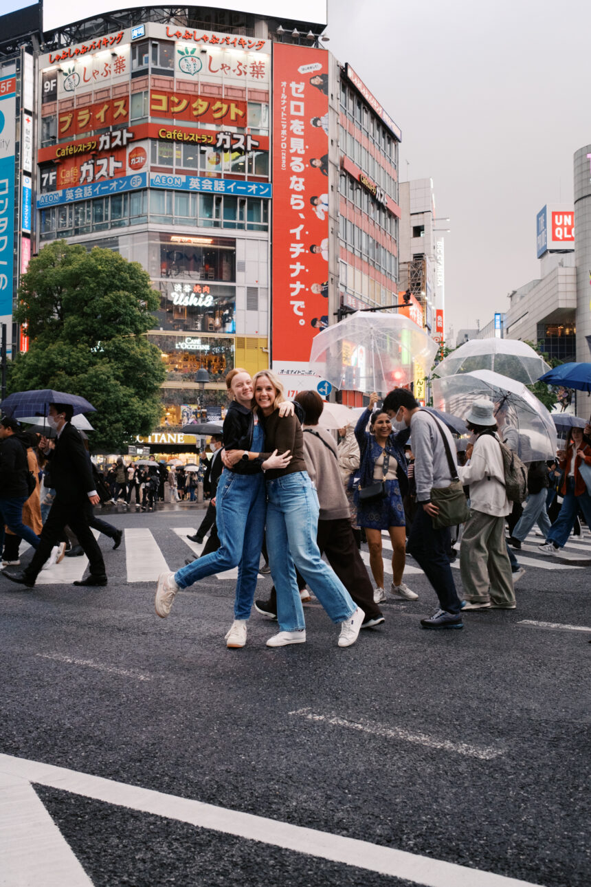 Katie and Frankie are standing in Shibuya crossing
