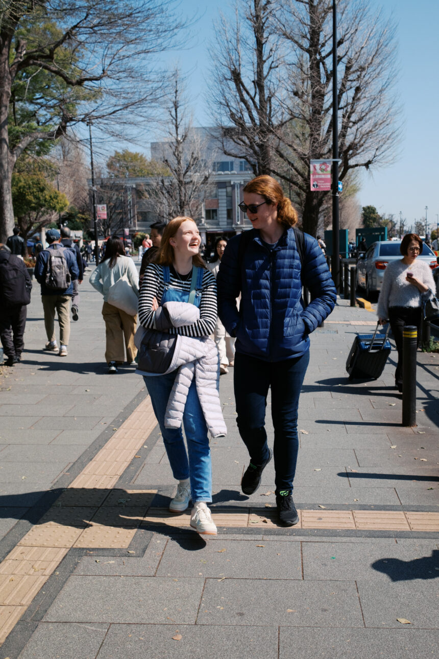 Siblings are walking together at Ueno Park